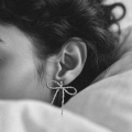 Srebrne kolczyki kokardki handmade Vander Jewelry – unikalna forma inspirowana radością i delikatnością